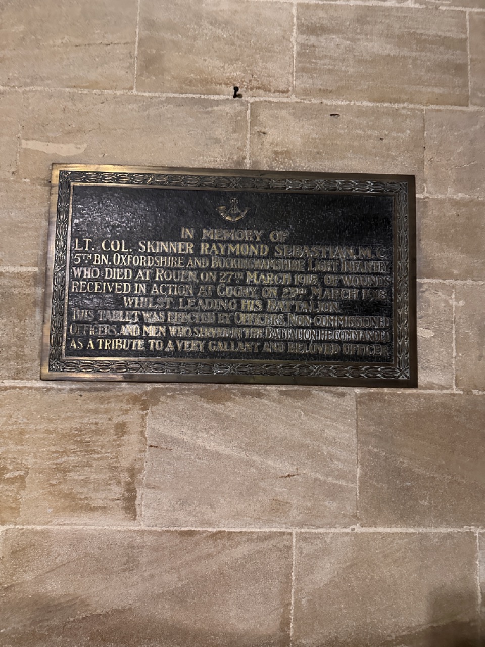 Brass memorial to Lieutenant Colonel Skinner Raymond Sebastian, recording wounds received at Cugny and death at Rouen in March 1918.